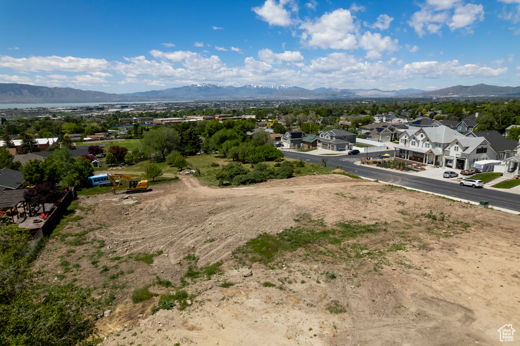 Aerial view of residential area with mountains