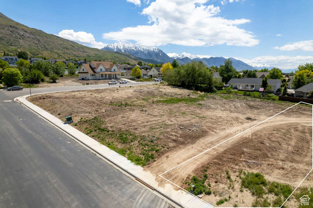View of mountain background featuring nearby suburban area
