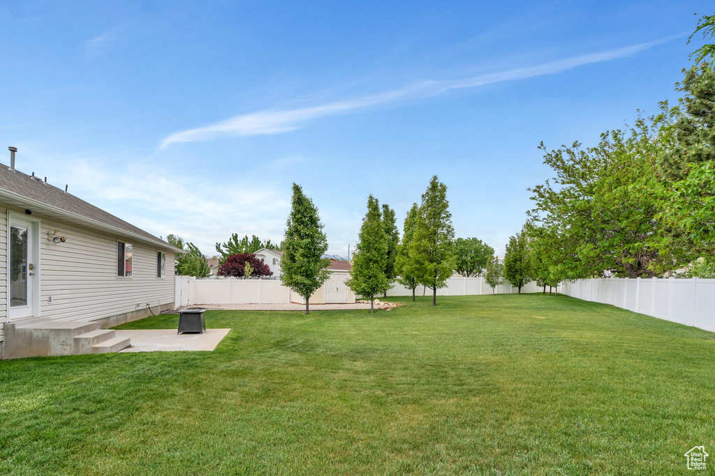 View of yard featuring a patio area