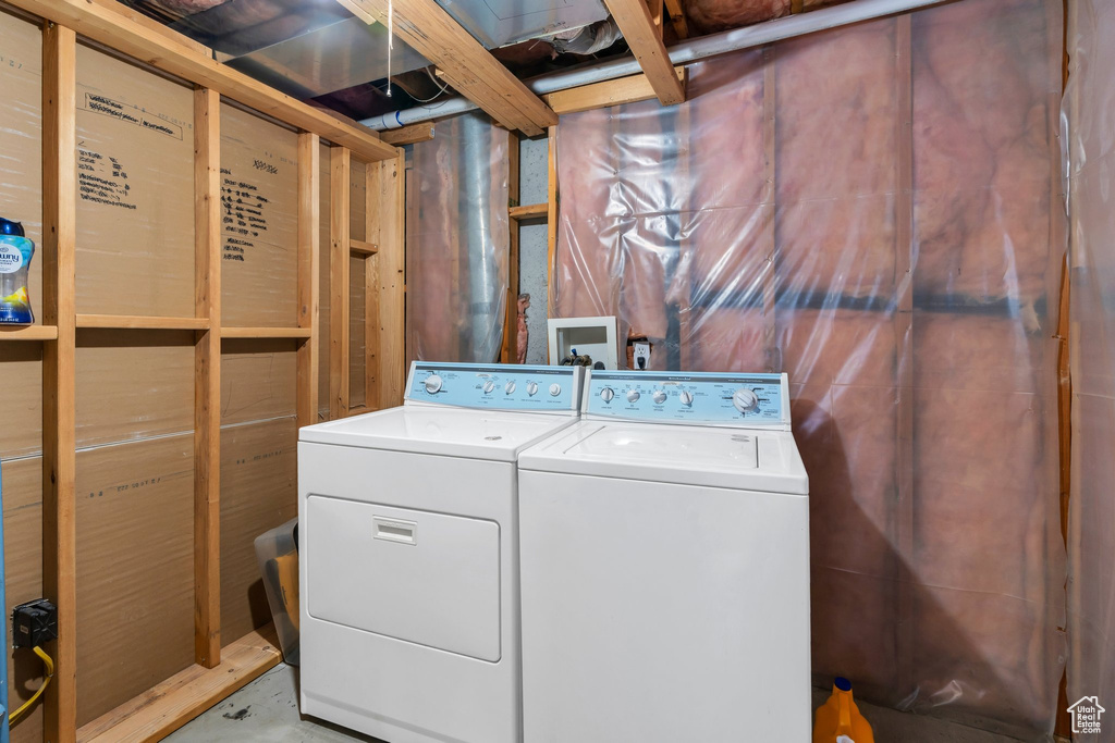 Laundry area featuring washer and clothes dryer