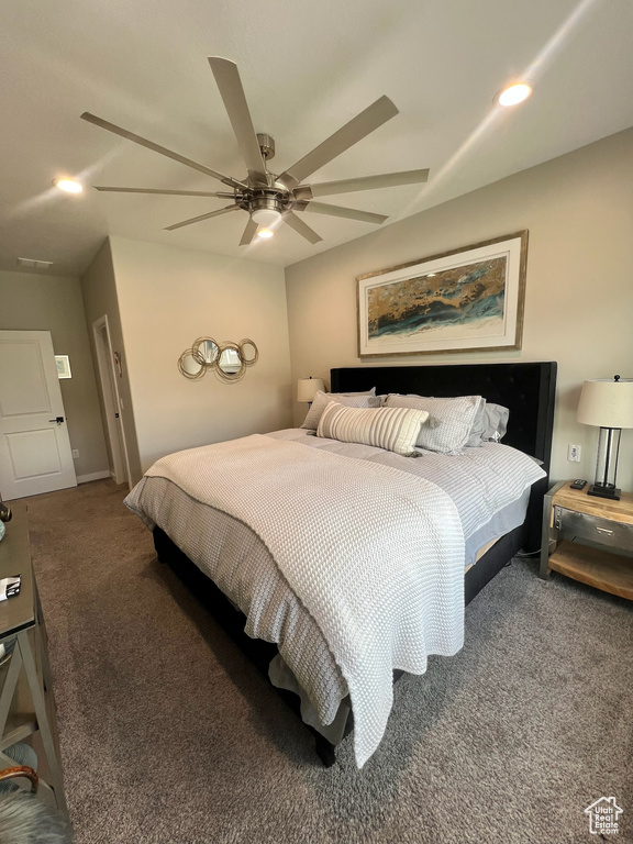 Carpeted bedroom featuring ceiling fan, recessed lighting, and baseboards