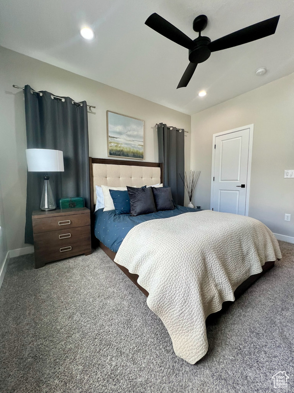 Carpeted bedroom featuring baseboards, recessed lighting, and ceiling fan