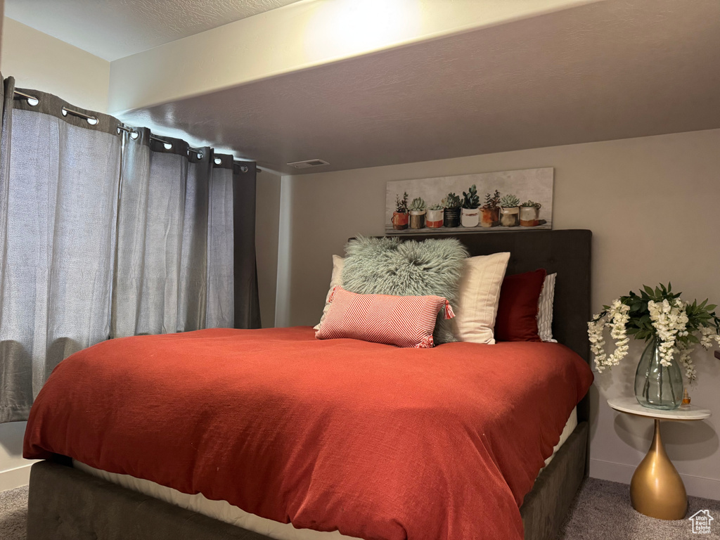 Bedroom with carpet