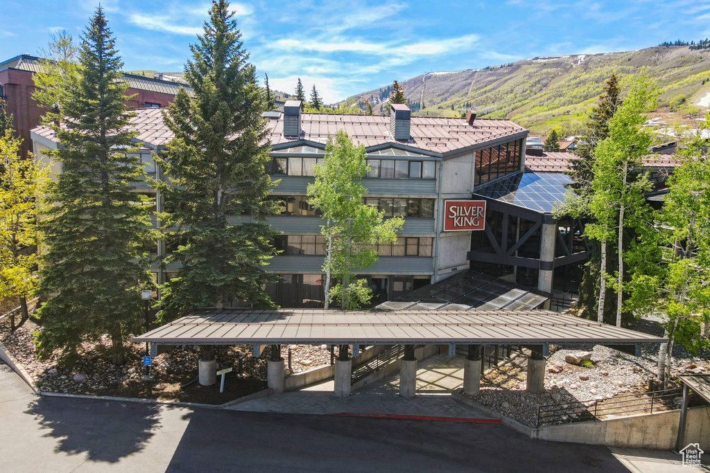 View of building exterior featuring a mountain view