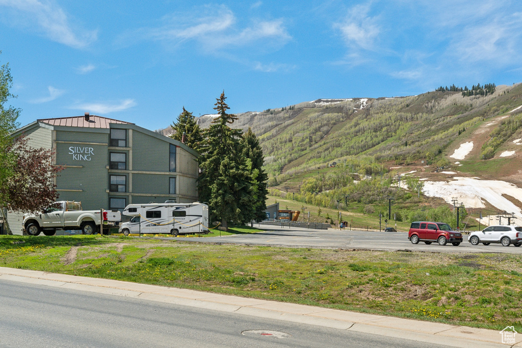 View of property with a mountain view