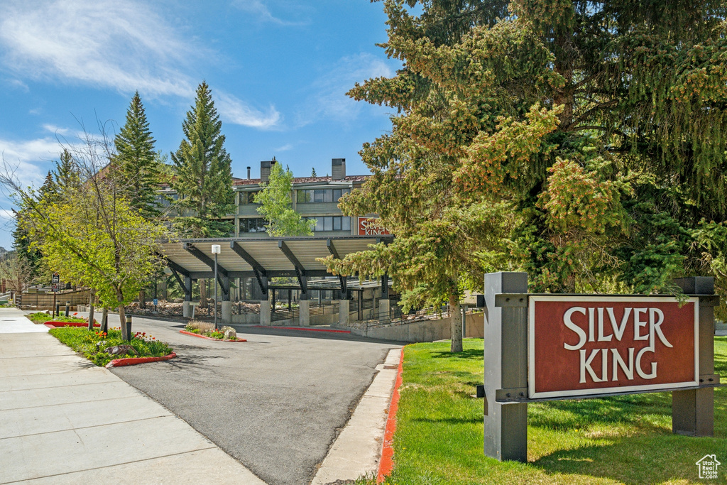 View of home's community featuring a lawn