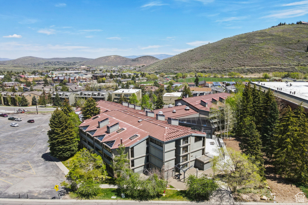 Aerial perspective of suburban area with a mountain backdrop
