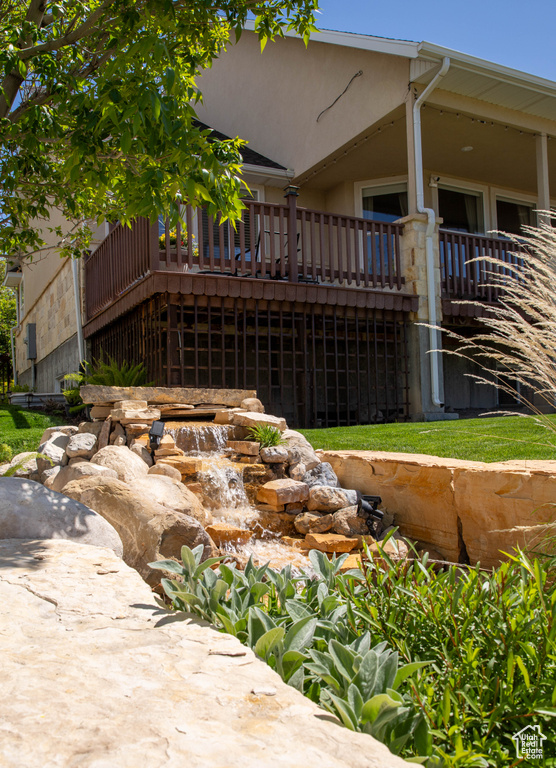 Exterior space featuring stucco siding