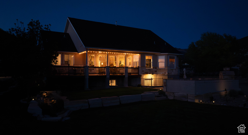 View of back of house at twilight