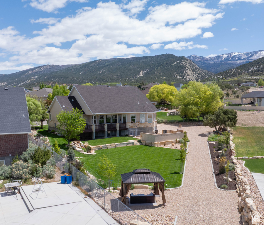 View of subject property featuring mountains