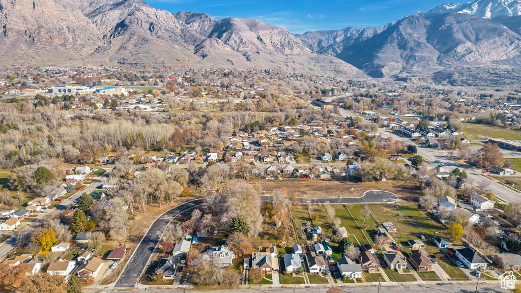 View of mountain background featuring nearby suburban area