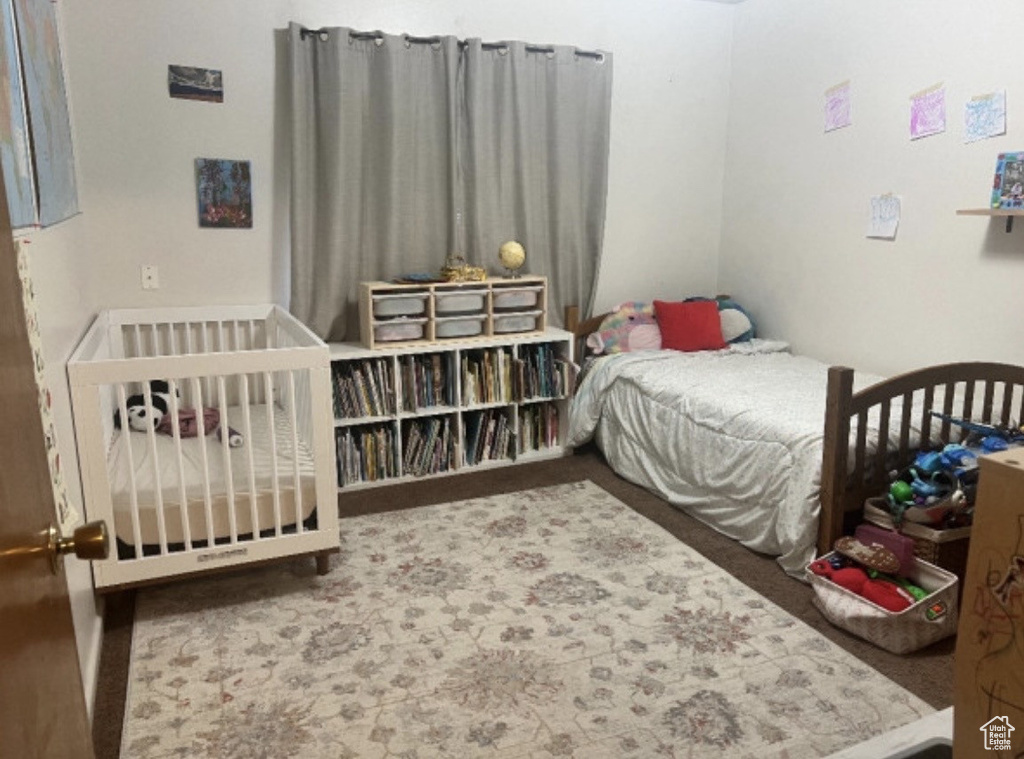 Bedroom with carpet
