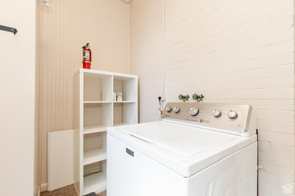 Laundry room featuring washer / dryer