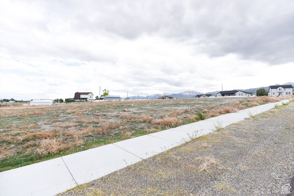 View of yard with a mountain view