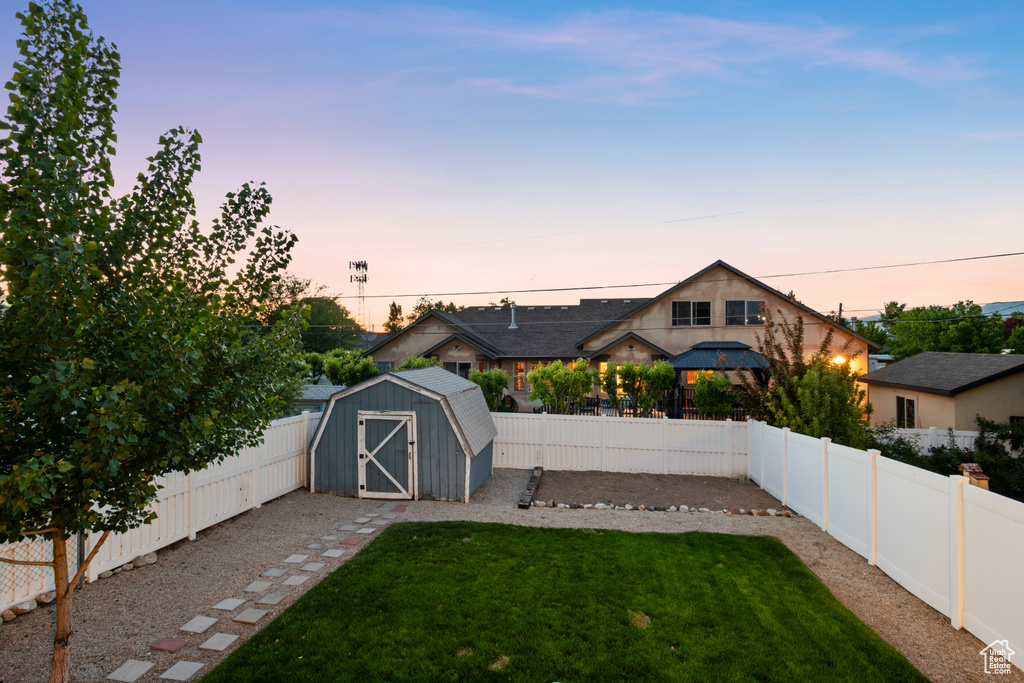 View of yard at dusk