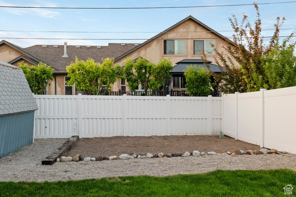 View of fenced backyard