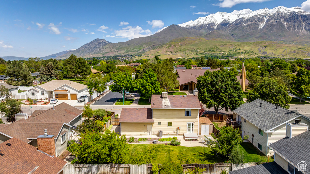 Aerial perspective of suburban area with mountains