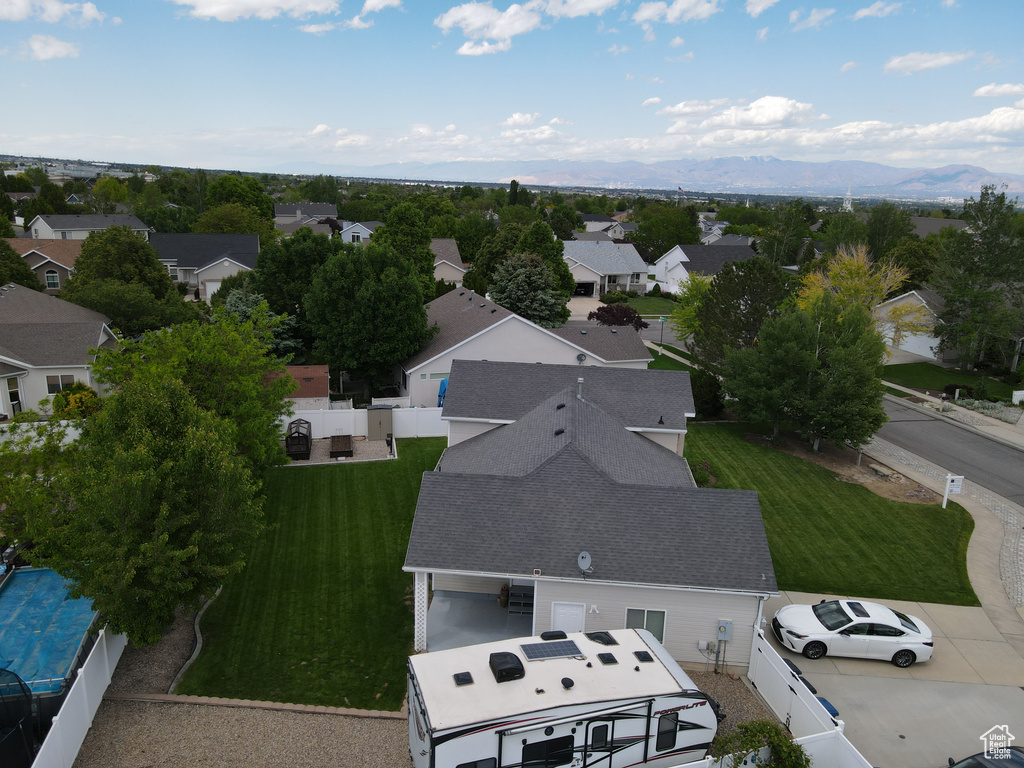 Aerial view of residential area with a mountainous background