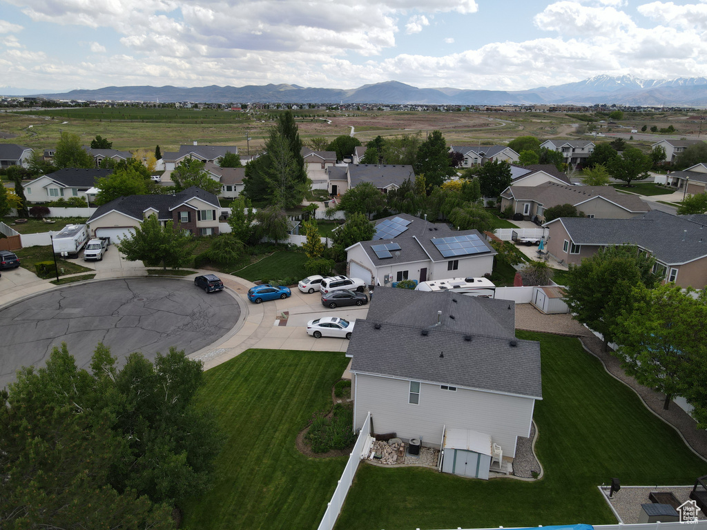 Aerial perspective of suburban area with mountains