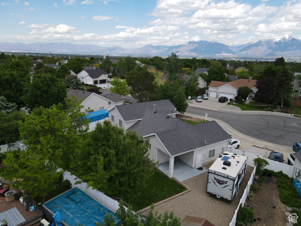 Aerial view of residential area with a mountain backdrop