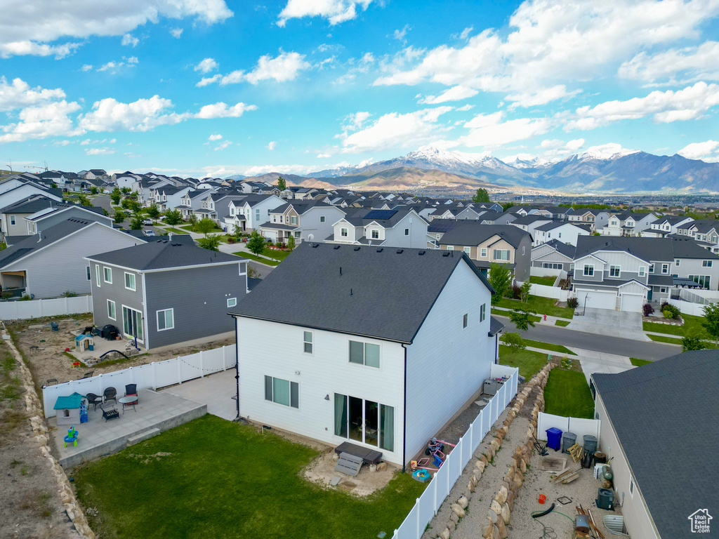 Aerial view of residential area with mountains