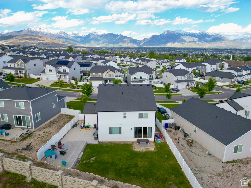 Aerial view of residential area with mountains