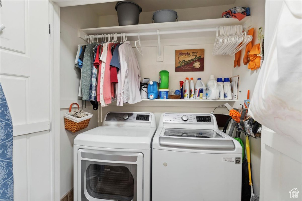 Laundry room with washing machine and dryer