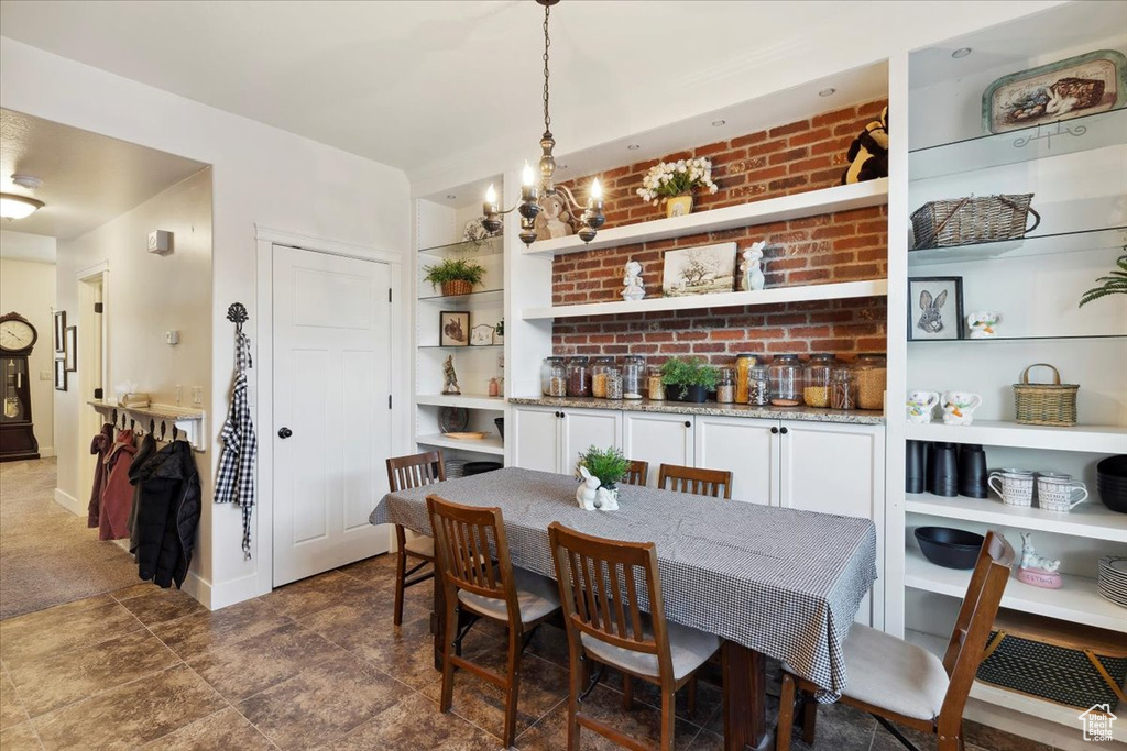 Dining space with a chandelier