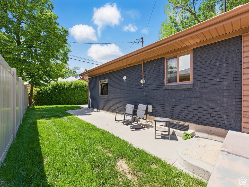 View of yard featuring a patio area