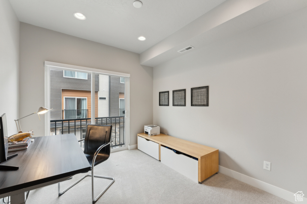 Home office with light carpet, baseboards, and recessed lighting