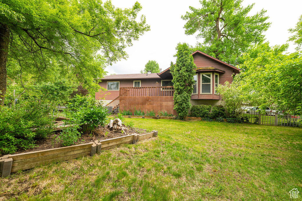 View of yard with a deck