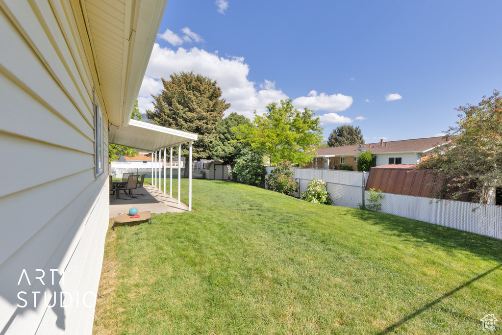 View of yard featuring a patio area