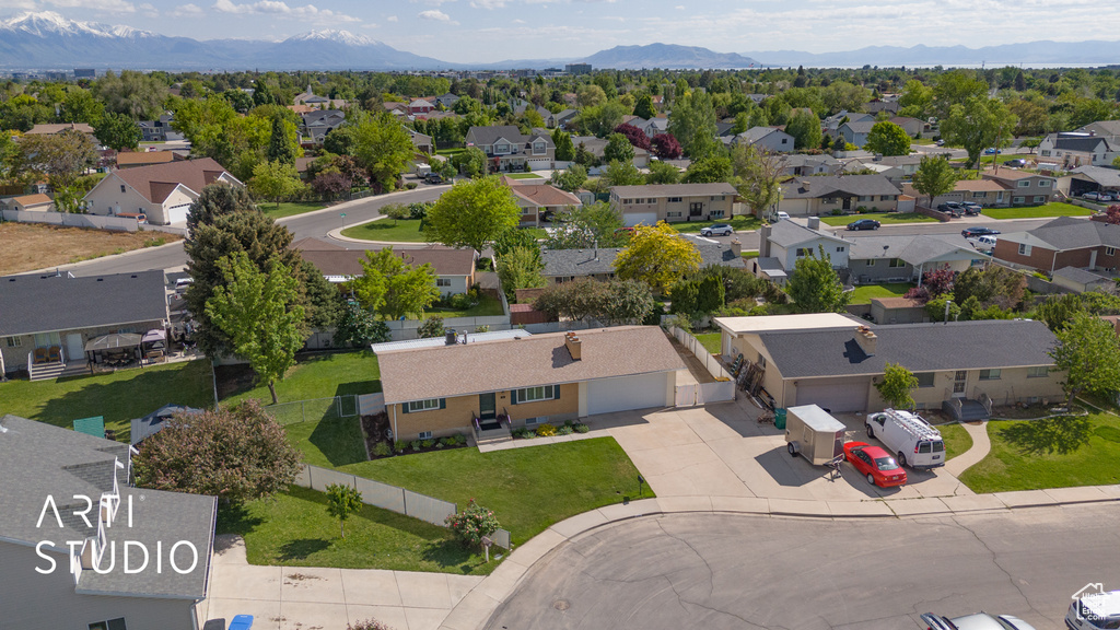 Aerial view of residential area with a mountain backdrop