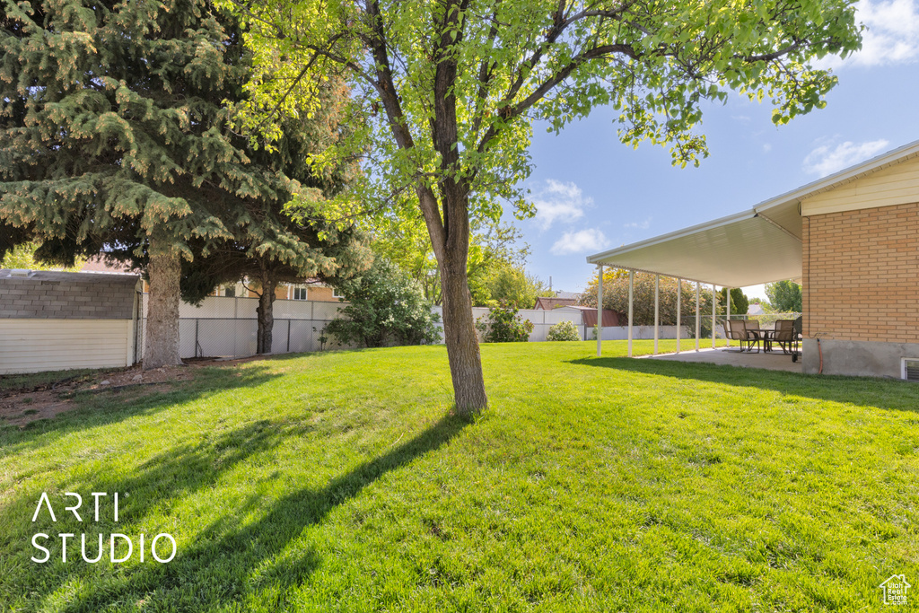 View of yard featuring a patio