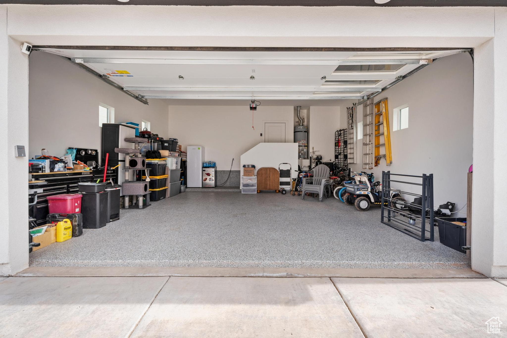 Garage with strapped water heater