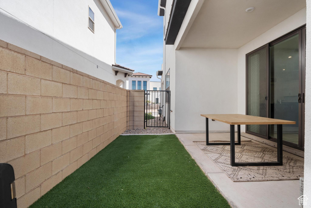 View of yard with a gate