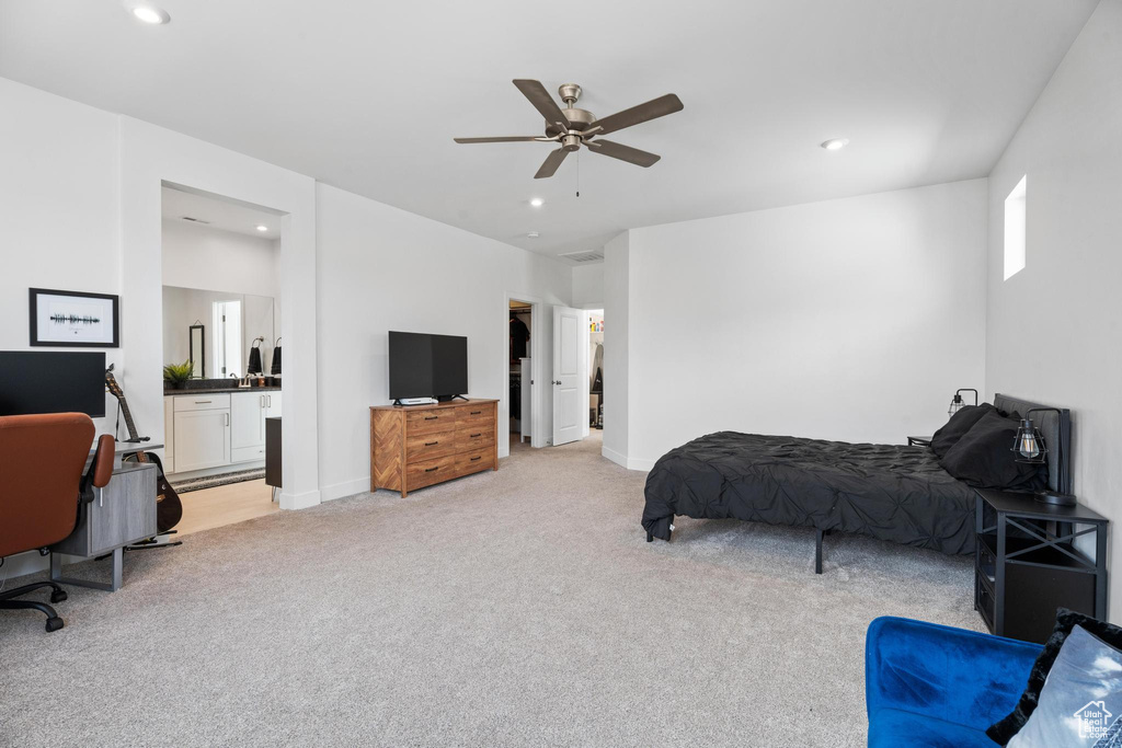 Bedroom with light carpet, recessed lighting, baseboards, and ceiling fan