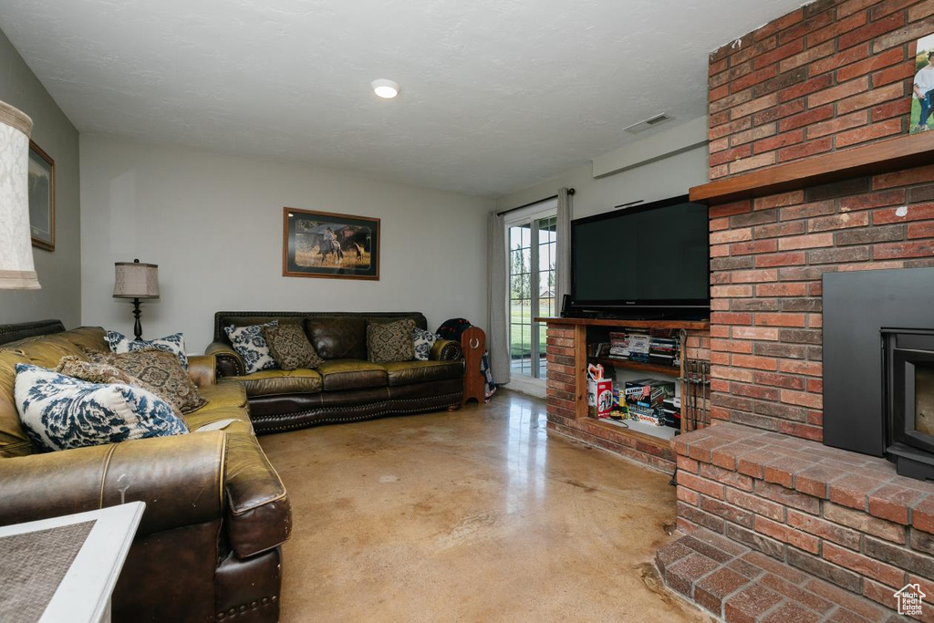 Living room with finished concrete floors