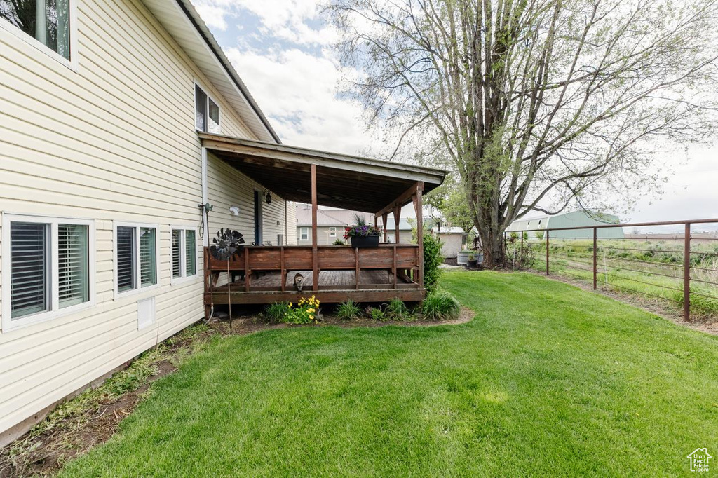 View of yard featuring a deck