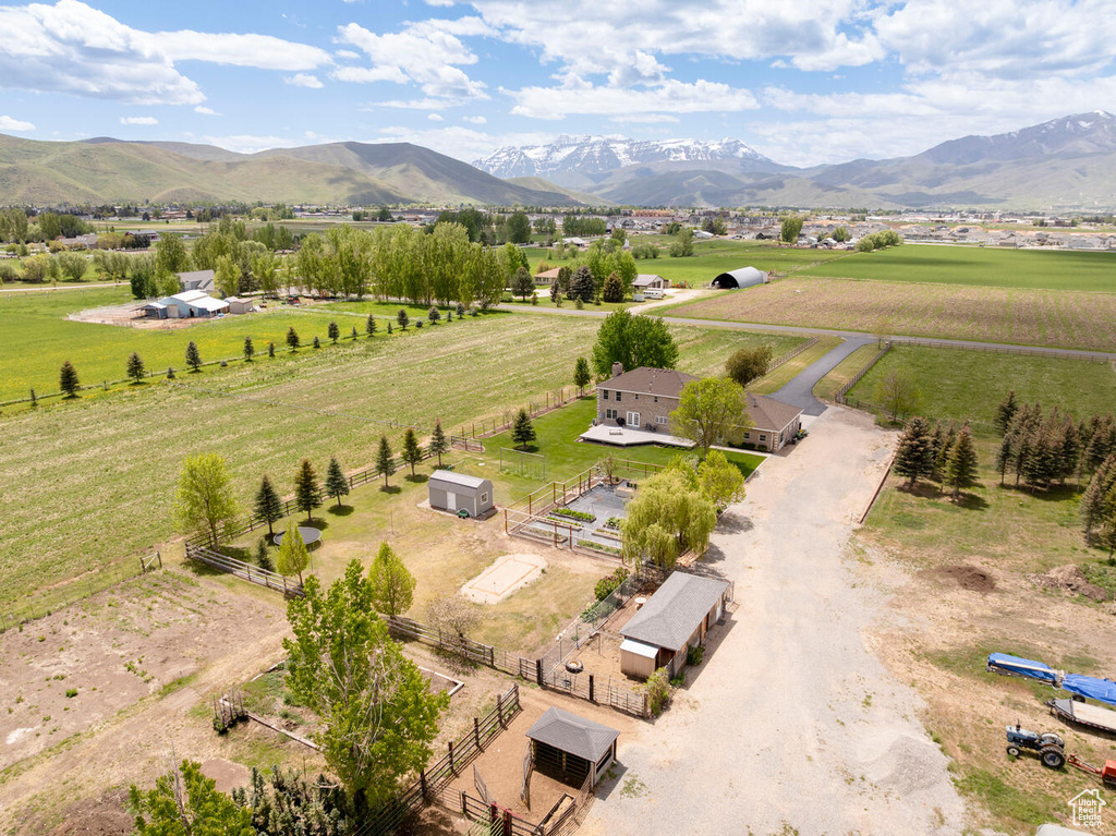 Overview of rural landscape featuring a mountainous background