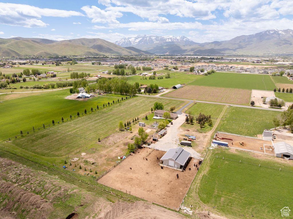 Overview of rural landscape featuring a mountain backdrop