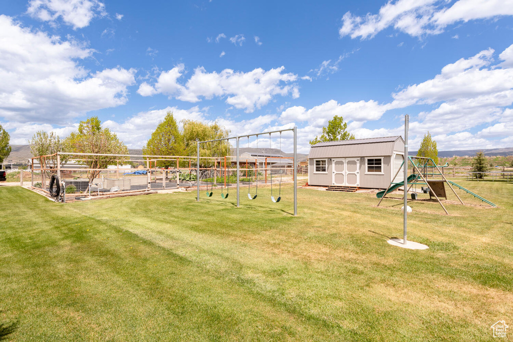 View of yard with a playground