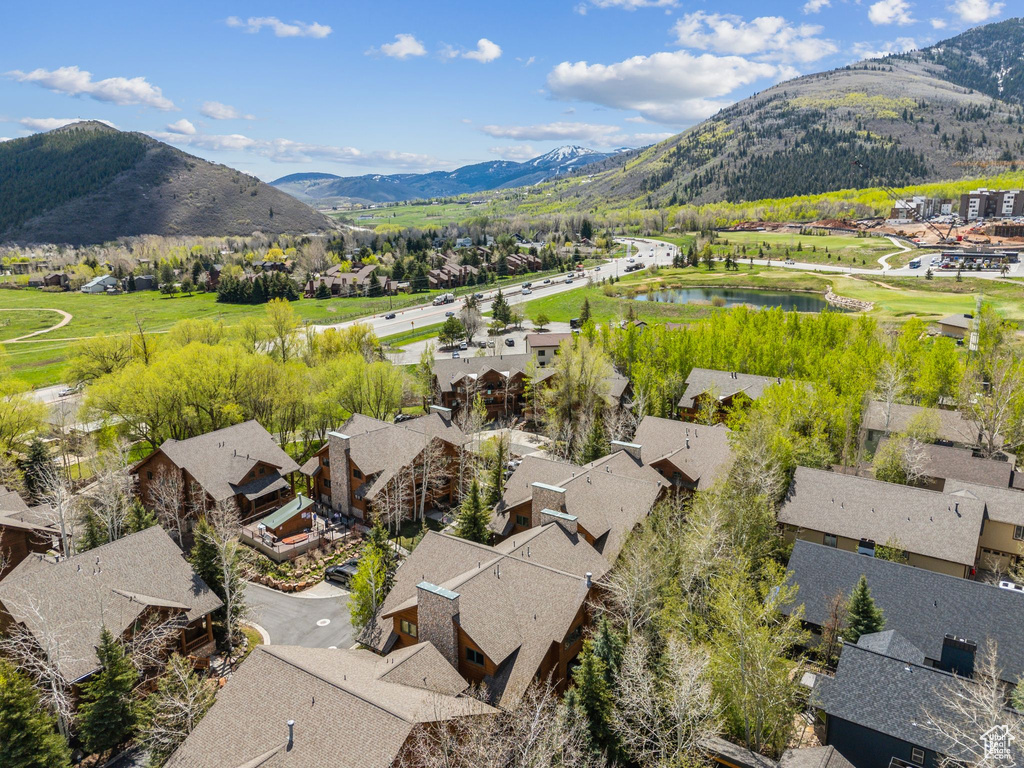 Aerial view of residential area with a water and mountain view