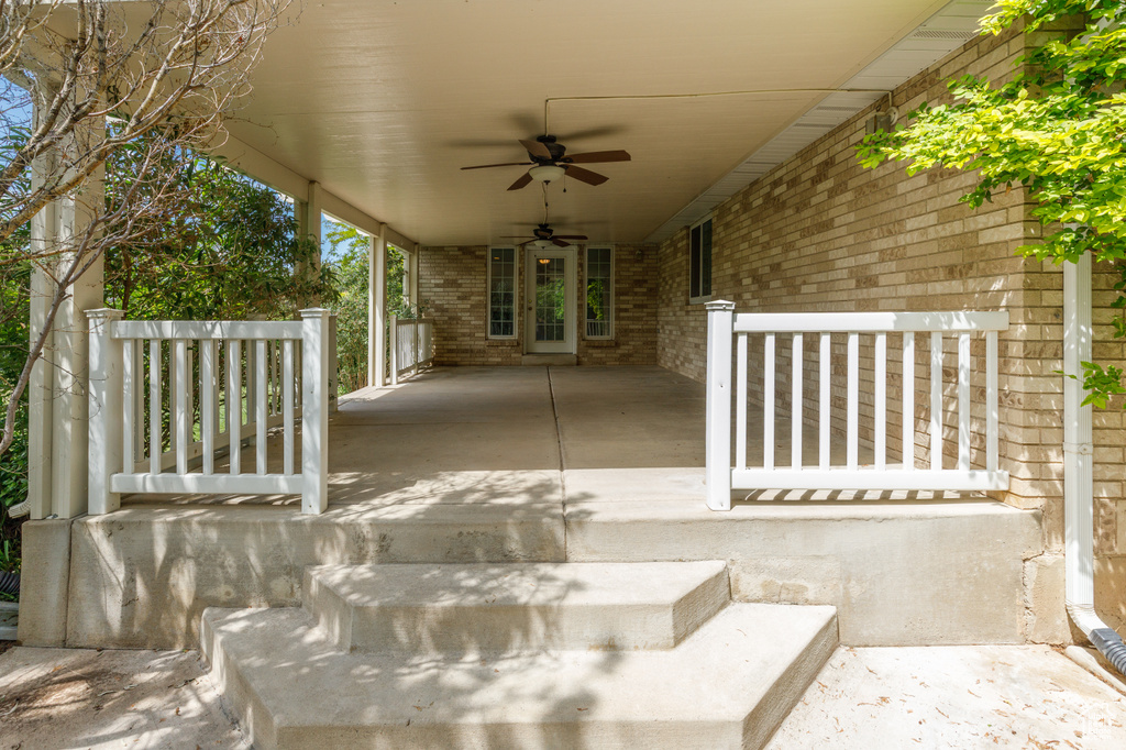 View of patio / terrace with a ceiling fan
