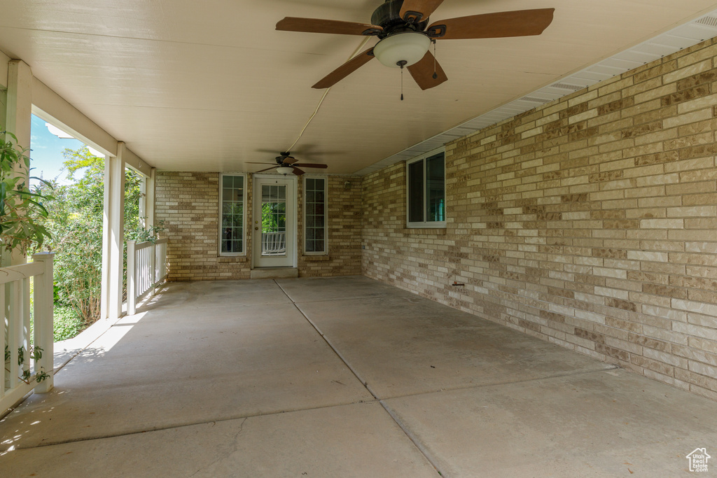 View of patio with ceiling fan
