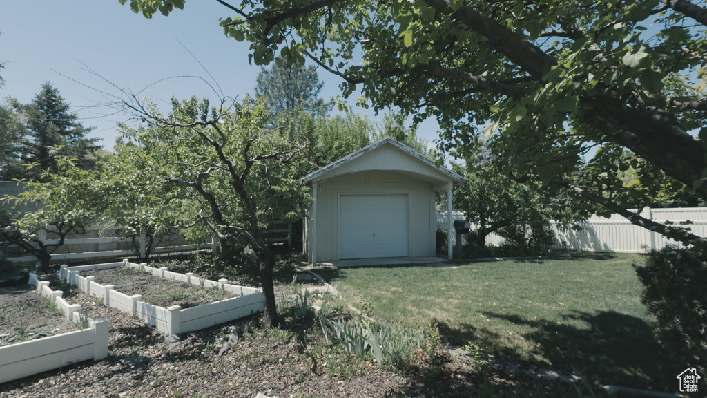 View of front of home featuring a garden