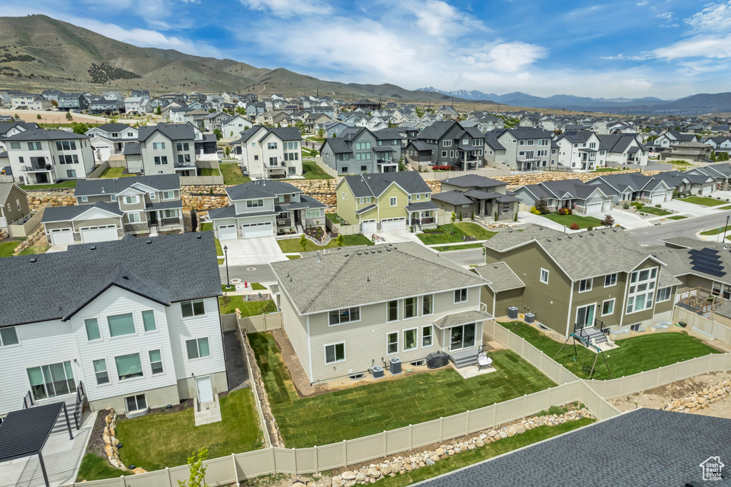 Aerial perspective of suburban area featuring mountains