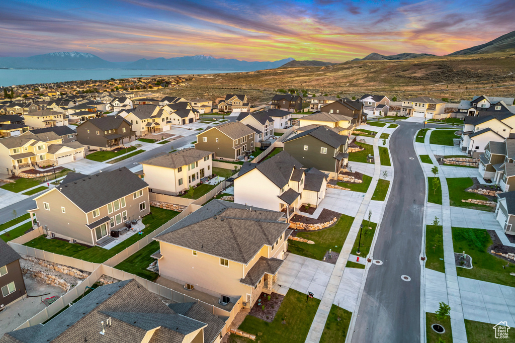 Aerial view at dusk of a residential view and a mountain view