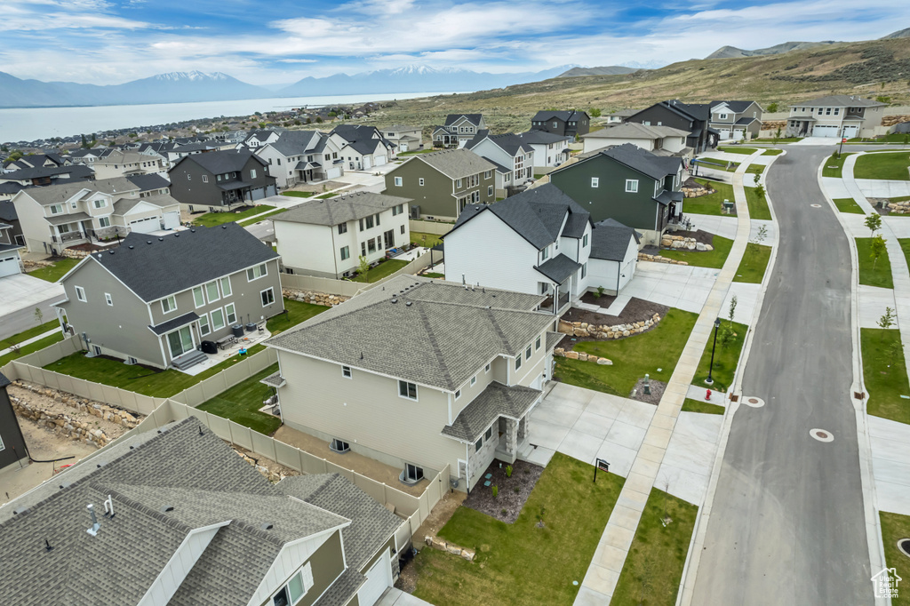 Aerial view of residential area with a mountain backdrop