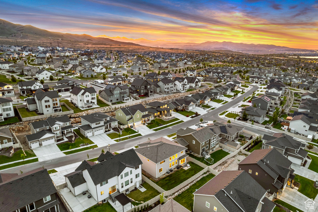 Aerial view at dusk of a mountain view and a residential view